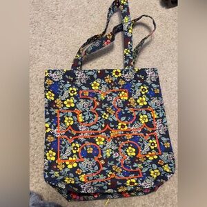 TORY BURCH PRINTED FLORAL LOGO TOTE $50
Size: 13 1/2" H x 12 1/2" L Tory Burch